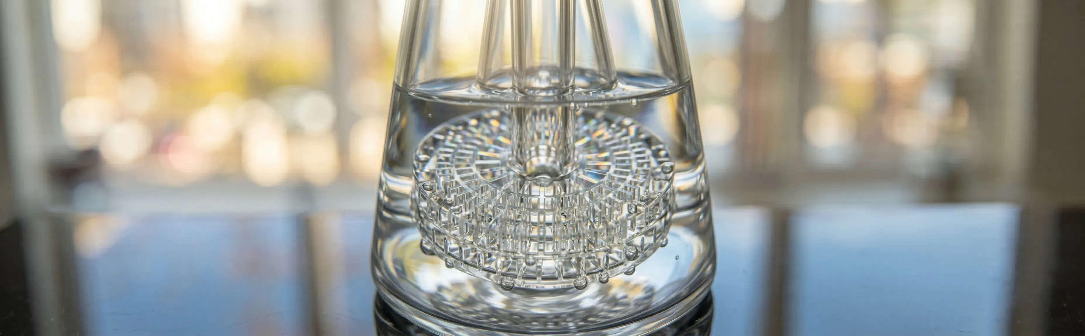 GAB Matrix Pillar close-up showing precision-cut micro-slits in lab-grade borosilicate 3.3 glass