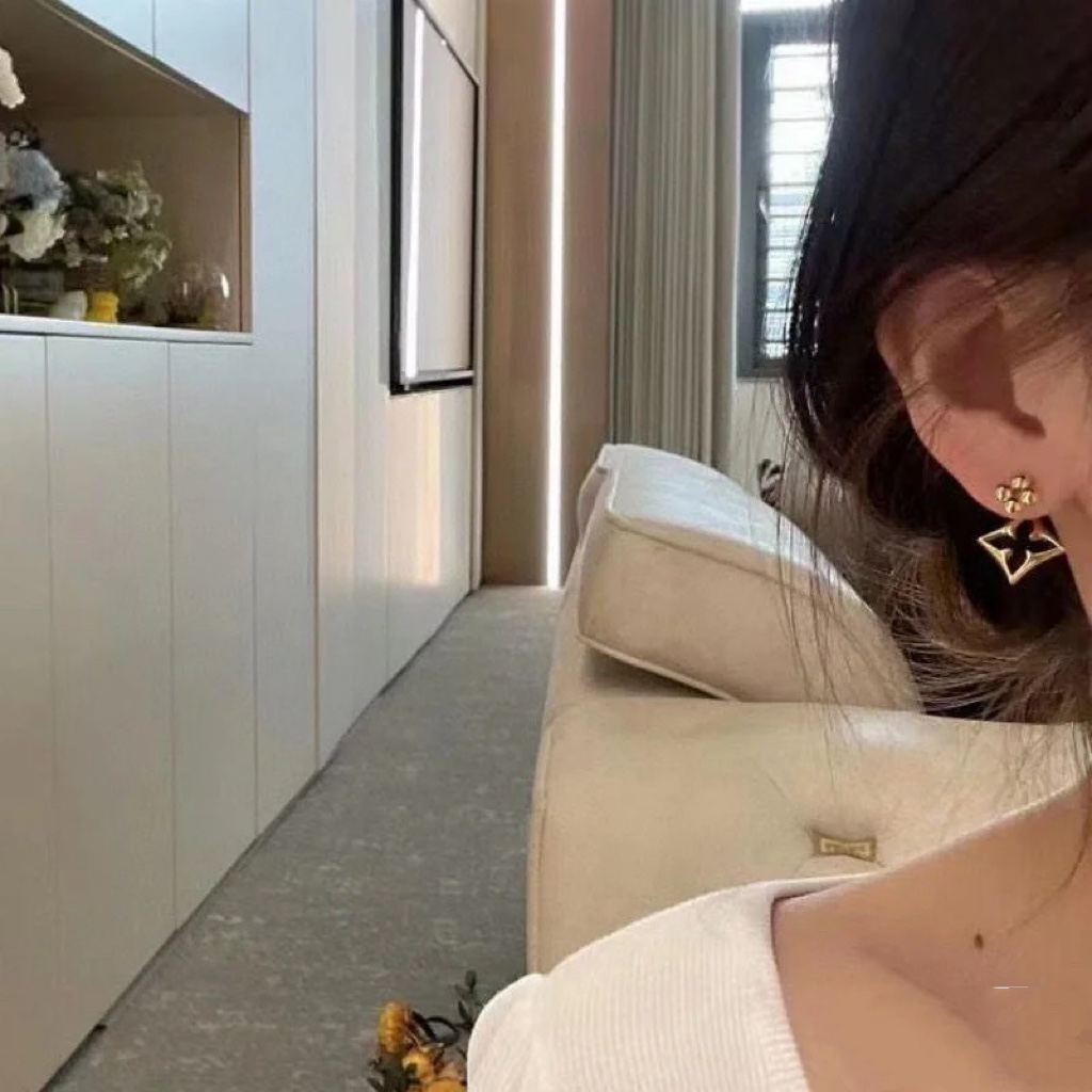 Louis Vuitton Asymmetric Hollow Stud Earrings - Original Replica Club