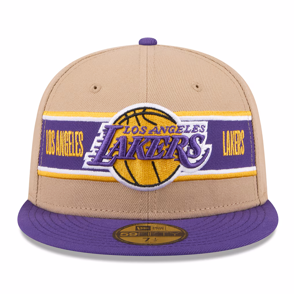 Front view of the Los Angeles Lakers 2024 NBA Draft fitted hat highlighting the embroidered team logo and horizontal purple and gold stripes.