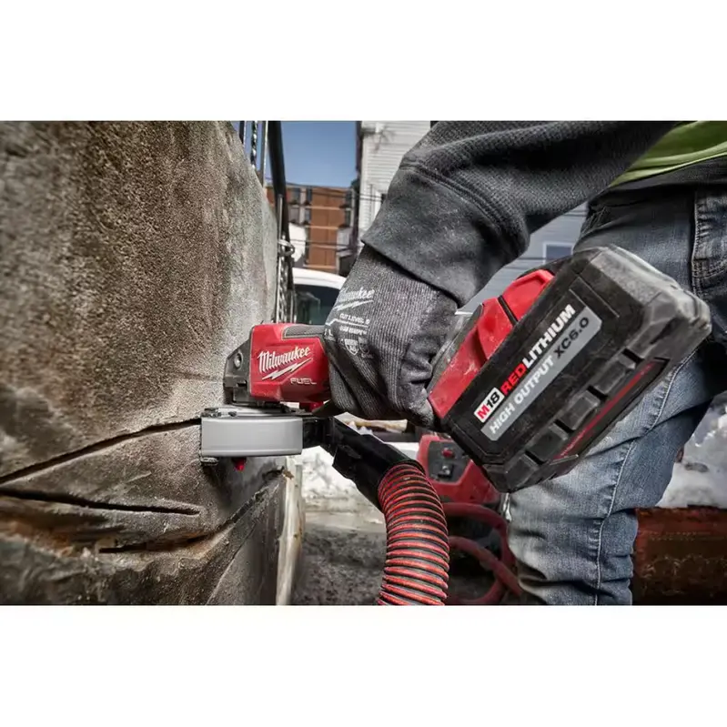 Milwaukee M18 FUEL 18V Brushless 4-1/2 in/5 in Angle Grinder With Paddle Switch - Two 6.0 Ah Batteries and Charger - Image 3 Milwaukee M18 FUEL 18V Brushless 4-1/2 in/5 in Angle Grinder With Paddle Switch - Two 6.0 Ah Batteries and Charger - Image 3