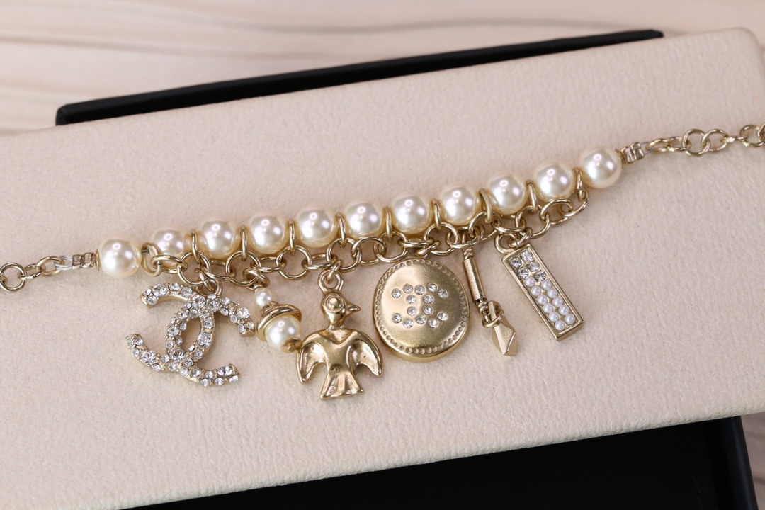 Chanel Bird CC Charms Chain Pearl Tassel Bracelet - Original Replica Club