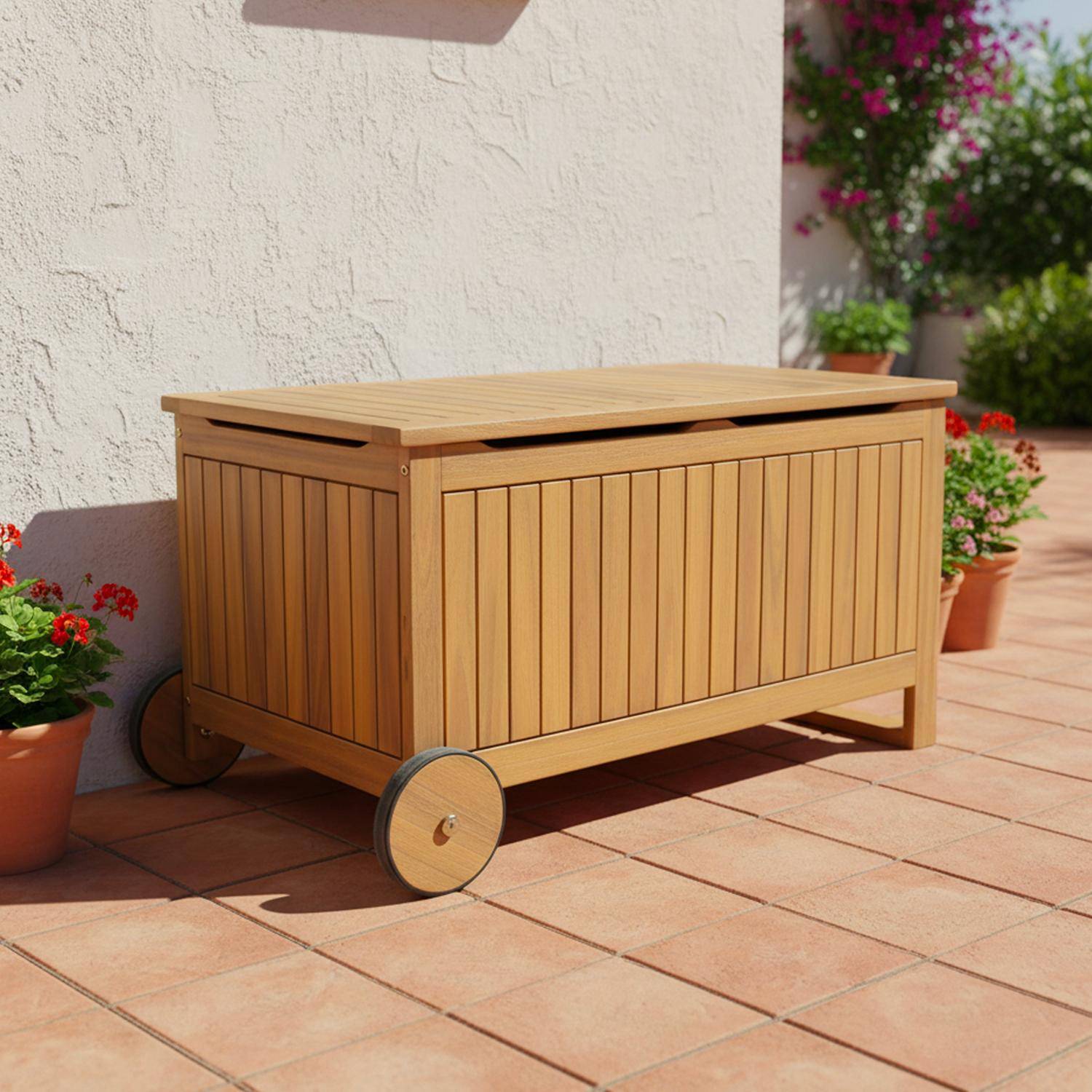 Kivo - Cofre de jardín de madera de acacia con ruedas, 119L