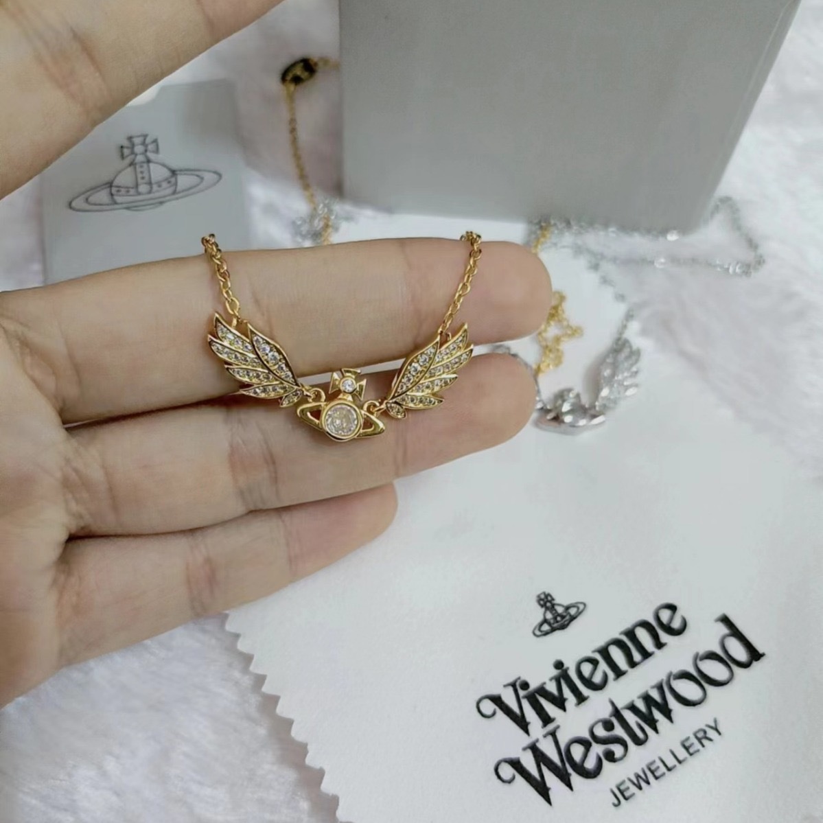 Vivienne Westwood Angel Wing Saturn Earrings - Original Replica Club