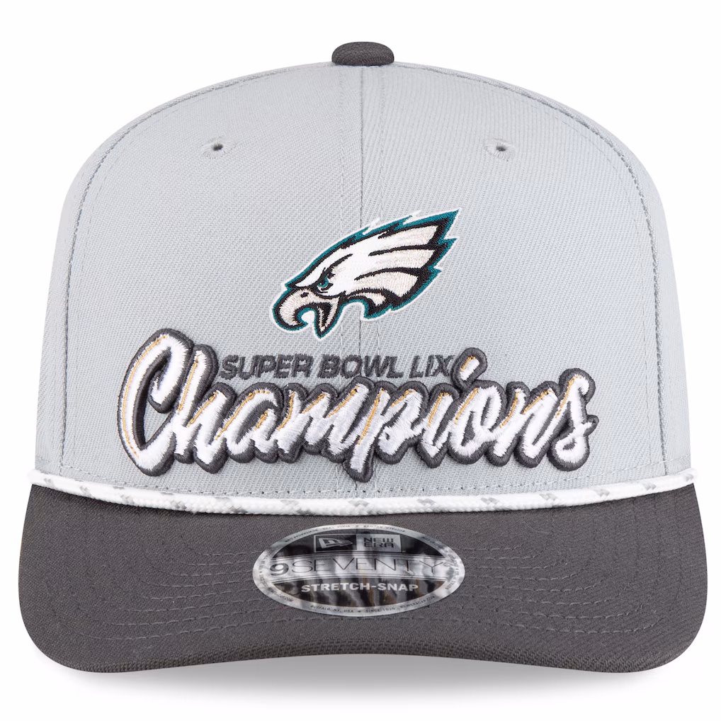 Close-up front view of the Eagles Super Bowl LIX Champions hat, highlighting the team logo and raised script embroidery.