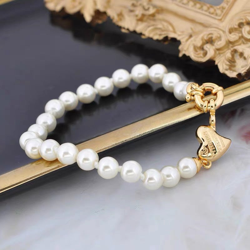 Vivienne Westwood Heart Charm Anchor Clasp Pearl Bracelet - Original Replica Club