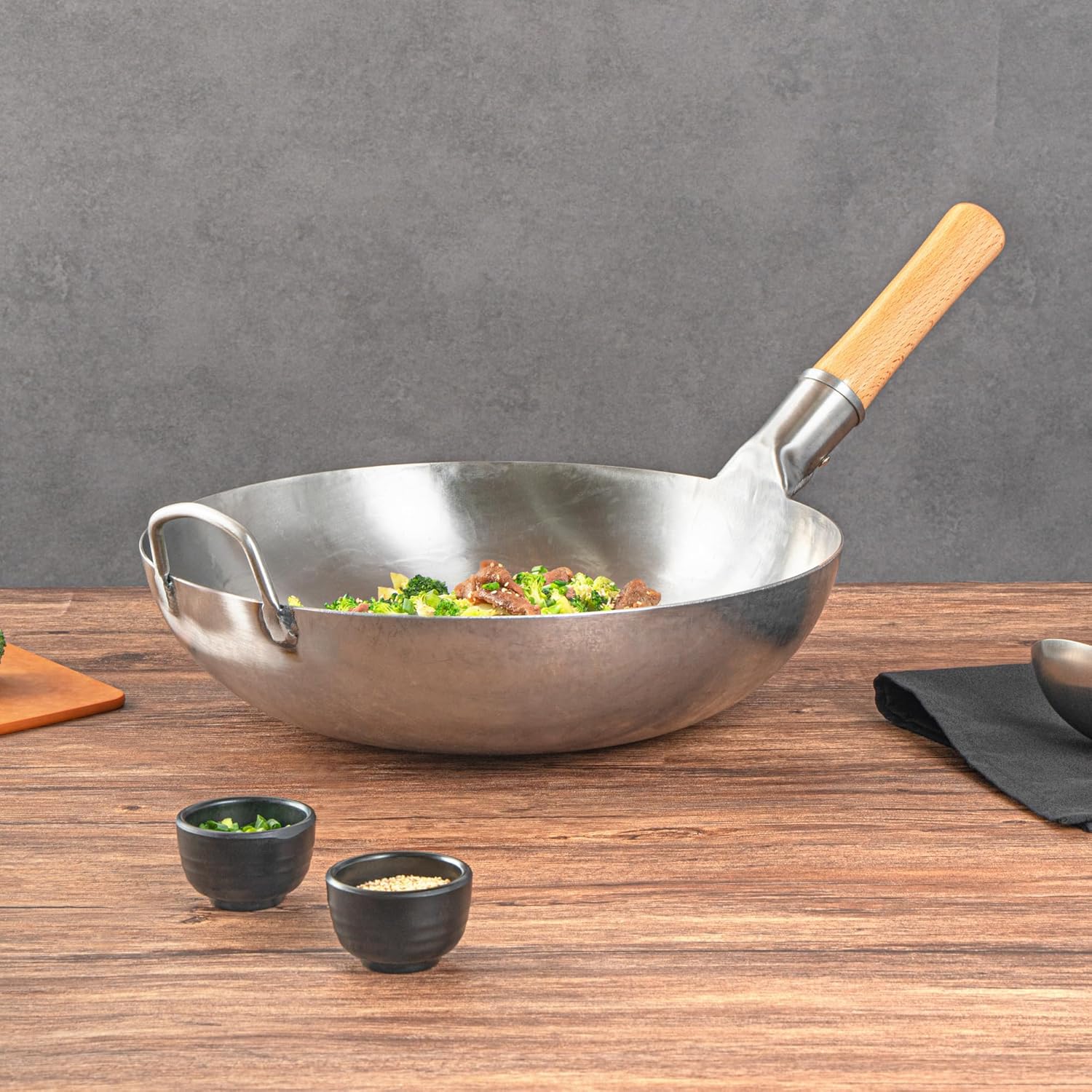 Restaurantware Carbon Steel Wok 1 Pack of 14 Inch Heavy-Duty Stir Fry Pan Silver Hand Hammered Wok Efficient Maneuvering Steel Helper Handle Uniform Heat Distribution Asian Cooking