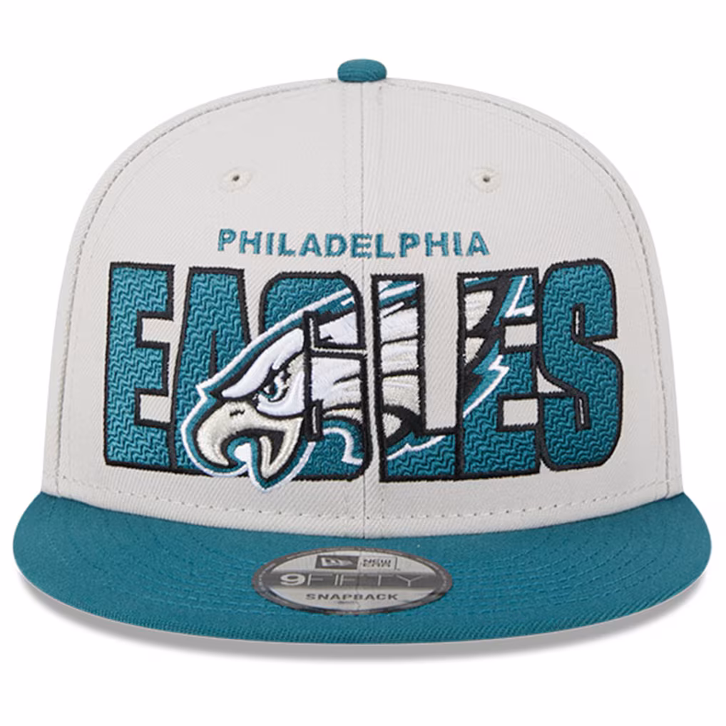 Straight front view of the Philadelphia Eagles Snapback Hat showing the heavily embroidered team name and logo on a stone-colored crown.