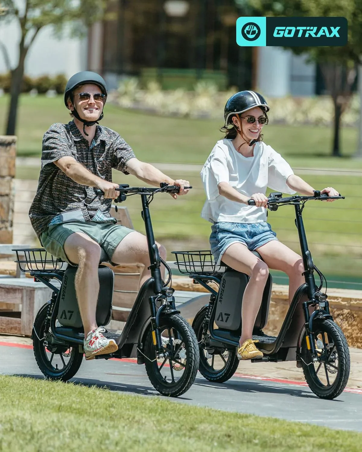 Gotrax adult electric scooter with seat maximum range of 19-25 miles all-terrain tires wide pedals