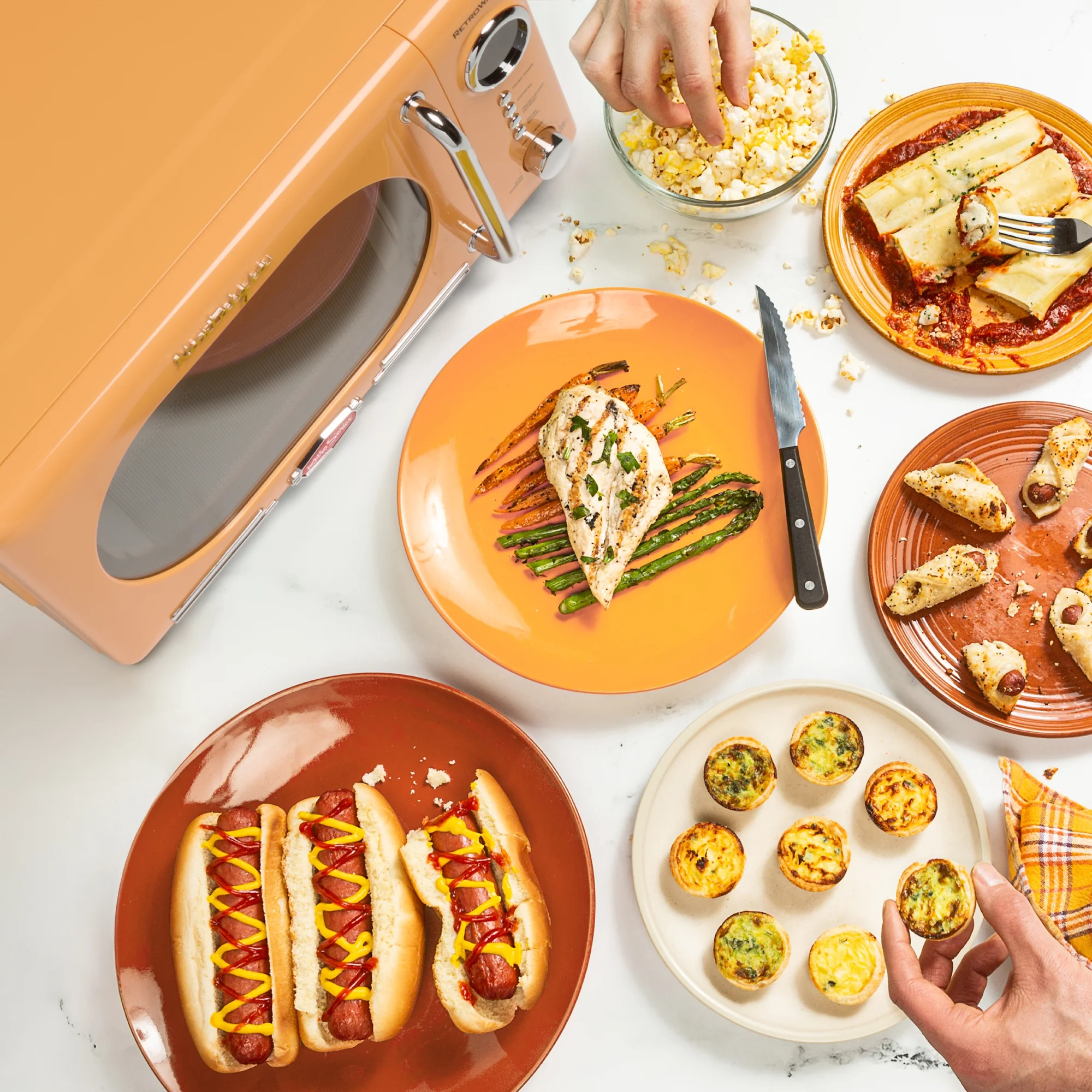 Nostalgia Retro Compact Countertop Microwave Oven - 0.7 Cu. Ft. - 700-Watts with LED Digital Display - Child Lock - Easy Clean Interior - Orange - Image 6