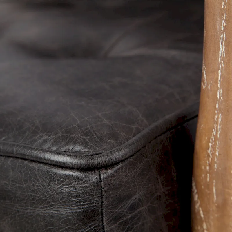 Phineas Black Genuine Leather Accent Chair with Brown Solid Wood Frame