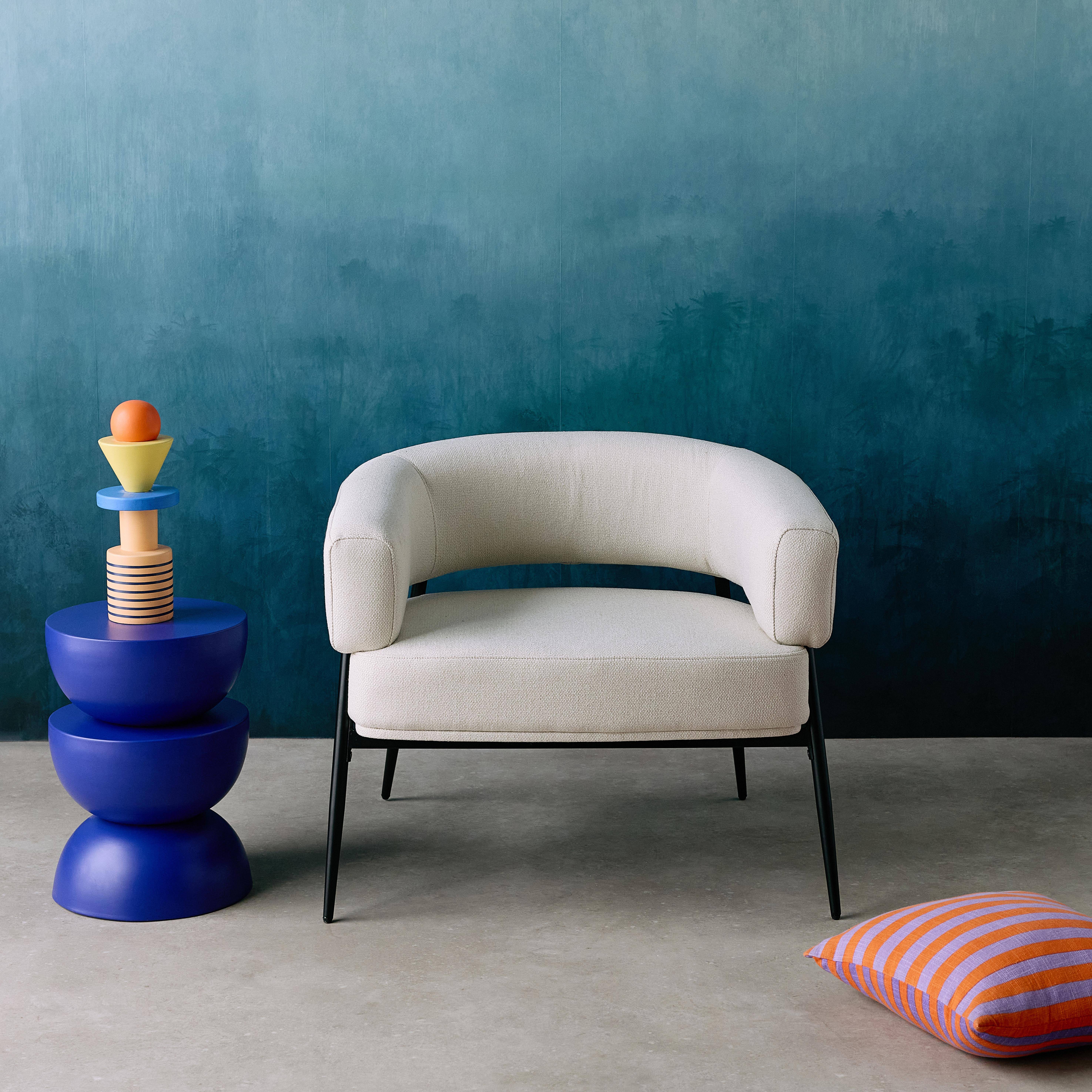 Cristo - Sillón de tela con respaldo curvo y patas de metal