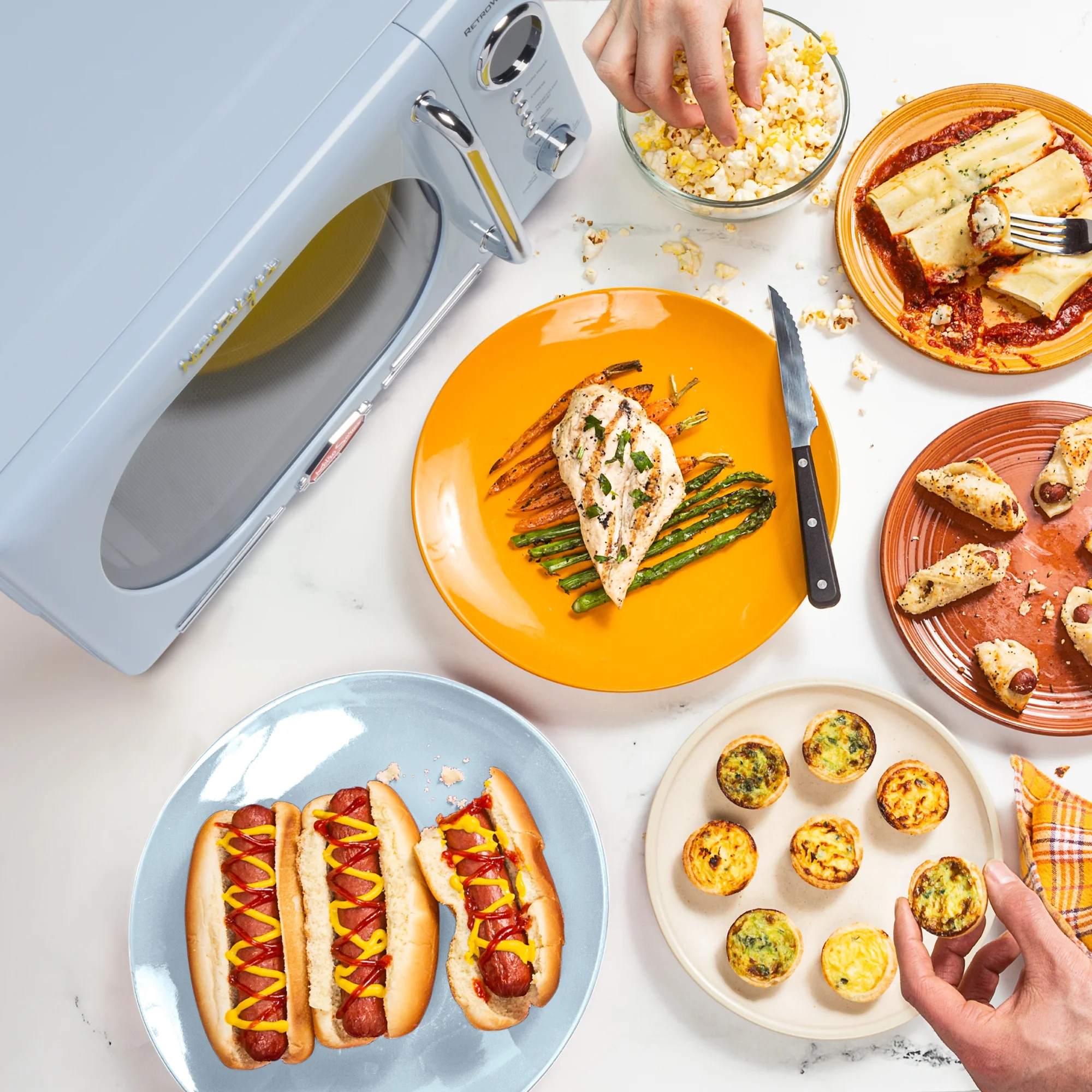 Nostalgia Retro Compact Countertop Microwave Oven - 0.7 Cu. Ft. - 700-Watts with LED Digital Display - Child Lock - Easy Clean Interior - Orange - Image 37