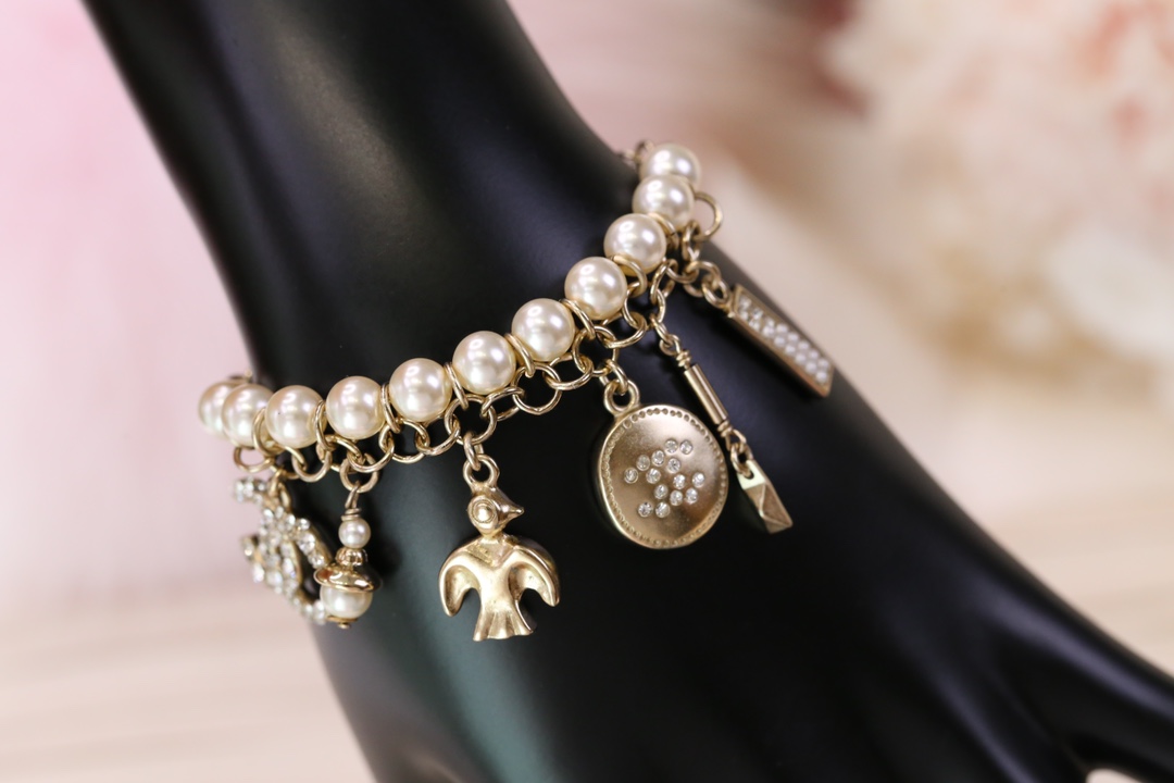 Chanel Bird CC Charms Chain Pearl Tassel Bracelet - Original Replica Club