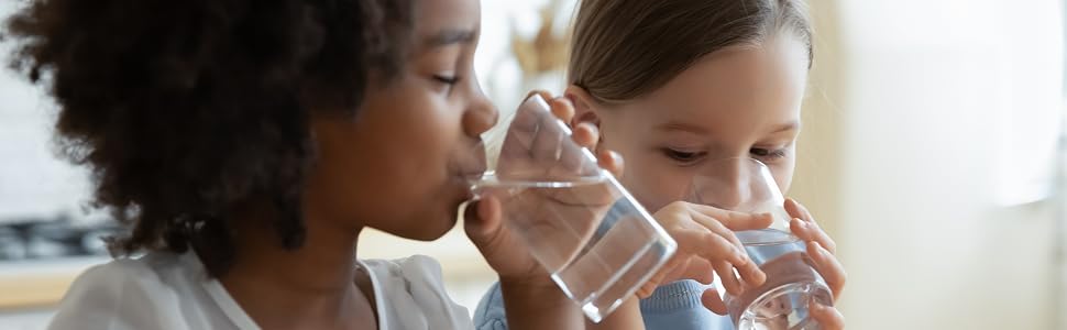 Children drinking refreshing water