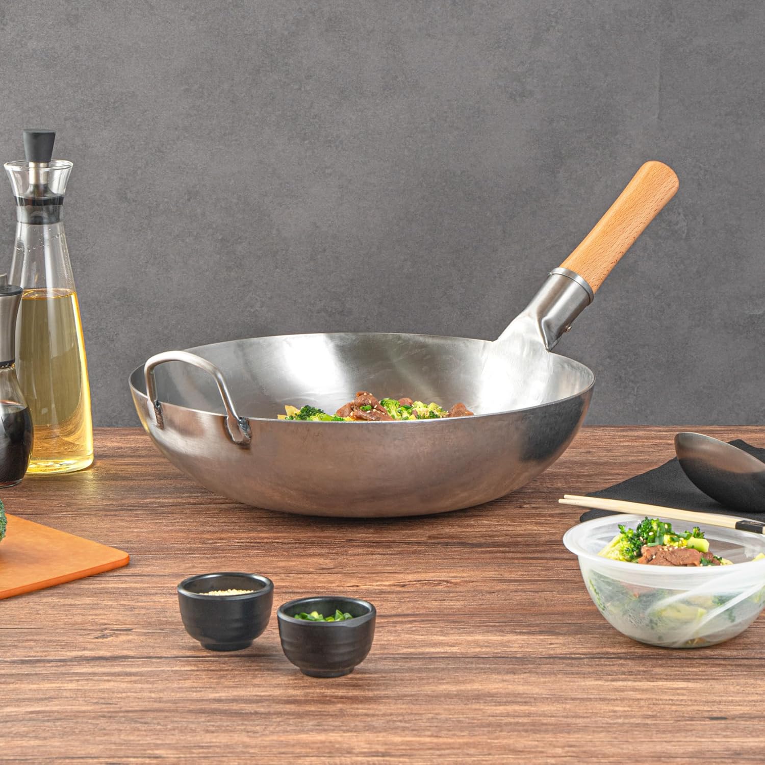 Restaurantware Carbon Steel Wok 1 Pack of 14 Inch Heavy-Duty Stir Fry Pan Silver Hand Hammered Wok Efficient Maneuvering Steel Helper Handle Uniform Heat Distribution Asian Cooking