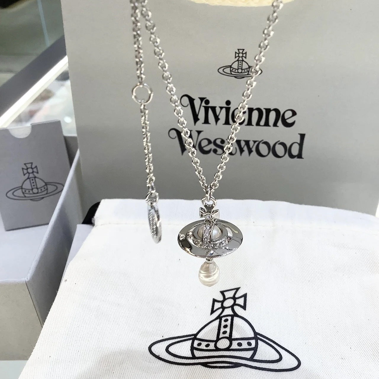 Vivienne Westwood Teardrop Saturn Necklace - Original Replica Club