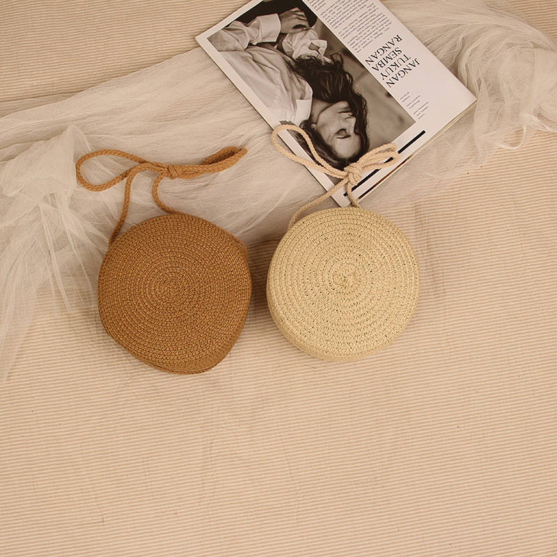 INS-style solid color straw bag, new fashion beach vacation woven shoulder and crossbody round bag for women