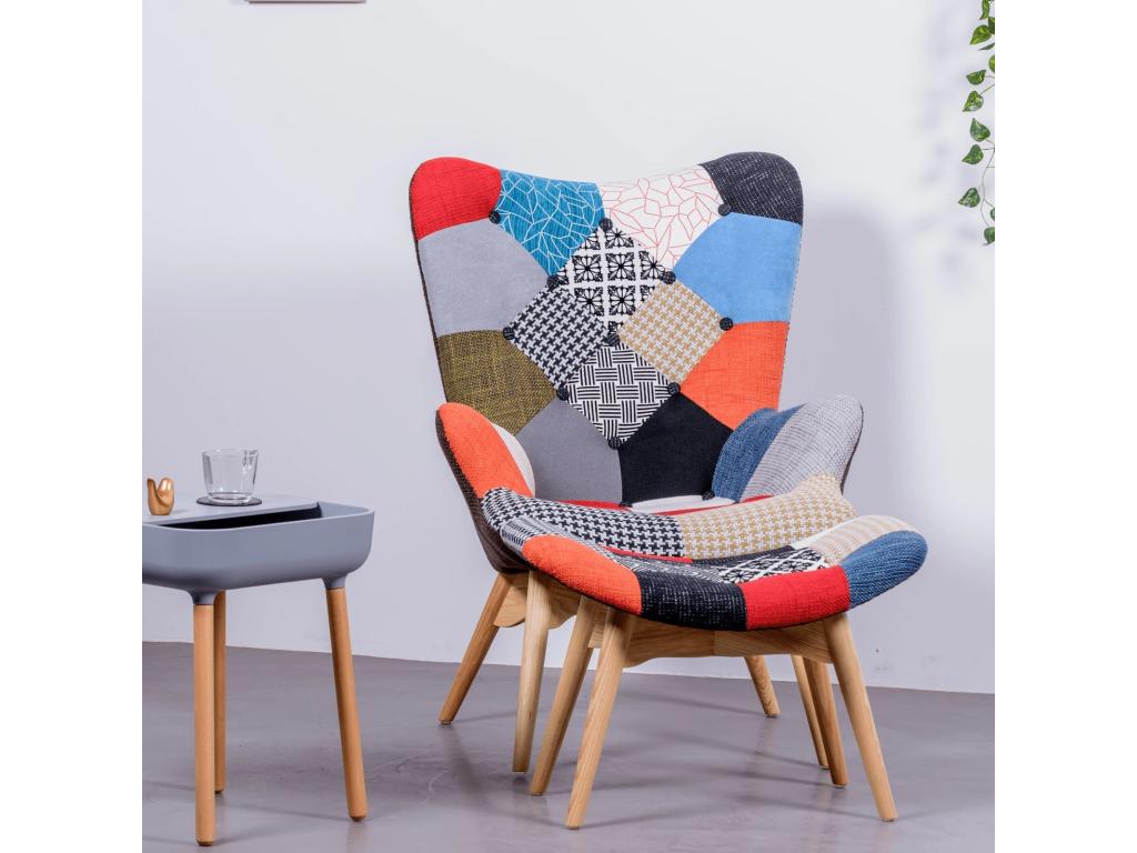 Sillón clásico con reposapiés tapizado en