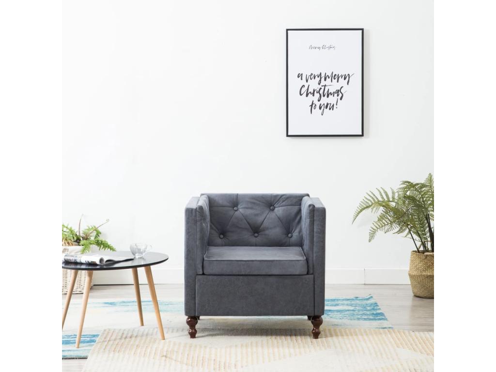 Sillón tapizado de tela gris