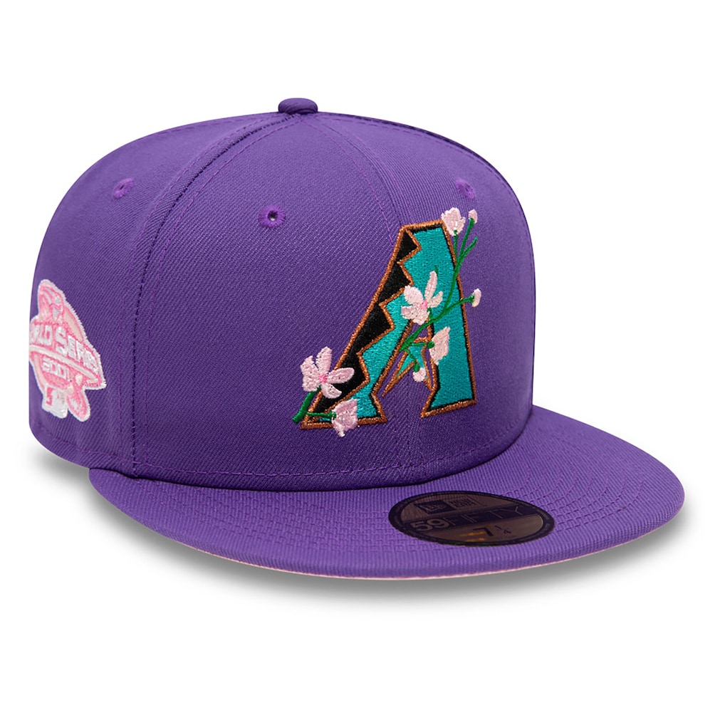 Purple New Era 59FIFTY fitted hat featuring the Arizona Diamondbacks logo with pink floral embroidery and a pink 2001 World Series side patch.