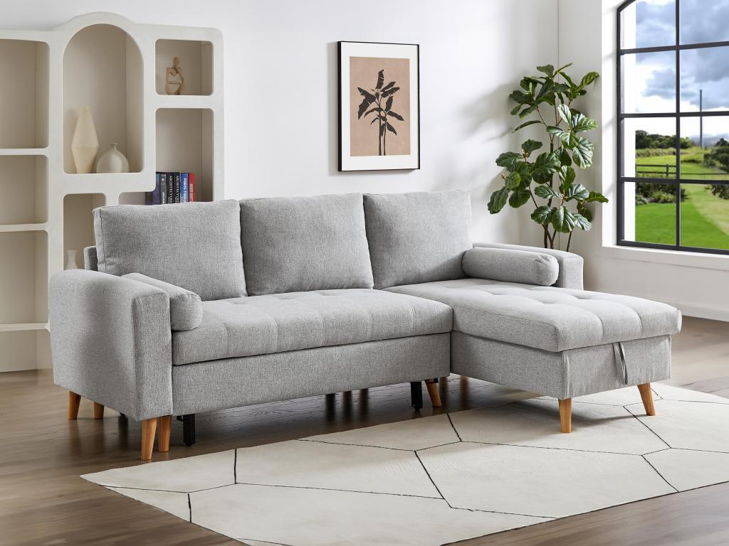 Sofá cama rinconera reversible de tela gris claro con arcón