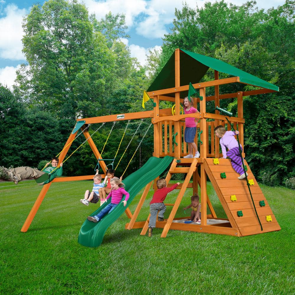 WAYFAIR DYI Outing III Wooden Outdoor Playset With Tarp Roof, Rock Wall, Wave Slide, Swings, And Backyard Swing Set Accessories