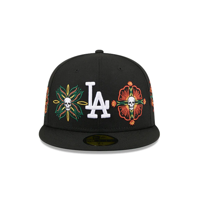 Front view of the New Era Los Angeles Dodgers Lifestyle Energy Hat featuring the white LA logo and colorful skull patterns.