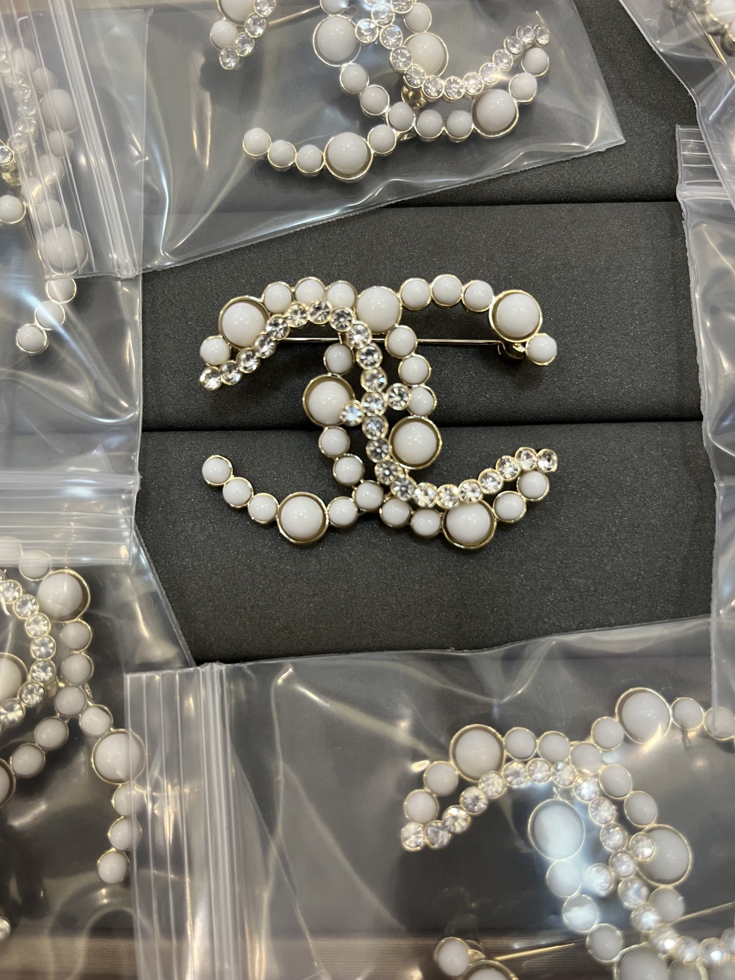 Chanel White Enamel and Diamond CC Brooch - Original Replica Club