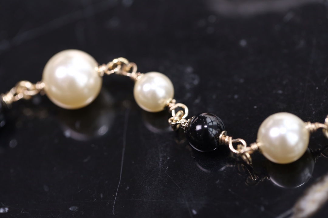 Chanel Black Bead Vintage Pearl Bracelet with CC Charm - Original Replica Club
