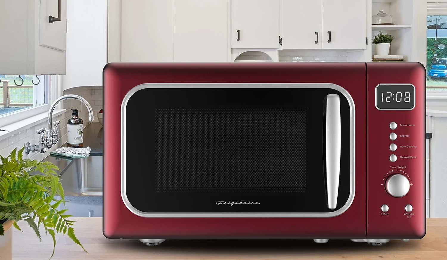 Frigidaire 0.7 Cu. Ft. Retro Countertop Microwave Oven, Black and Gold - Image 18