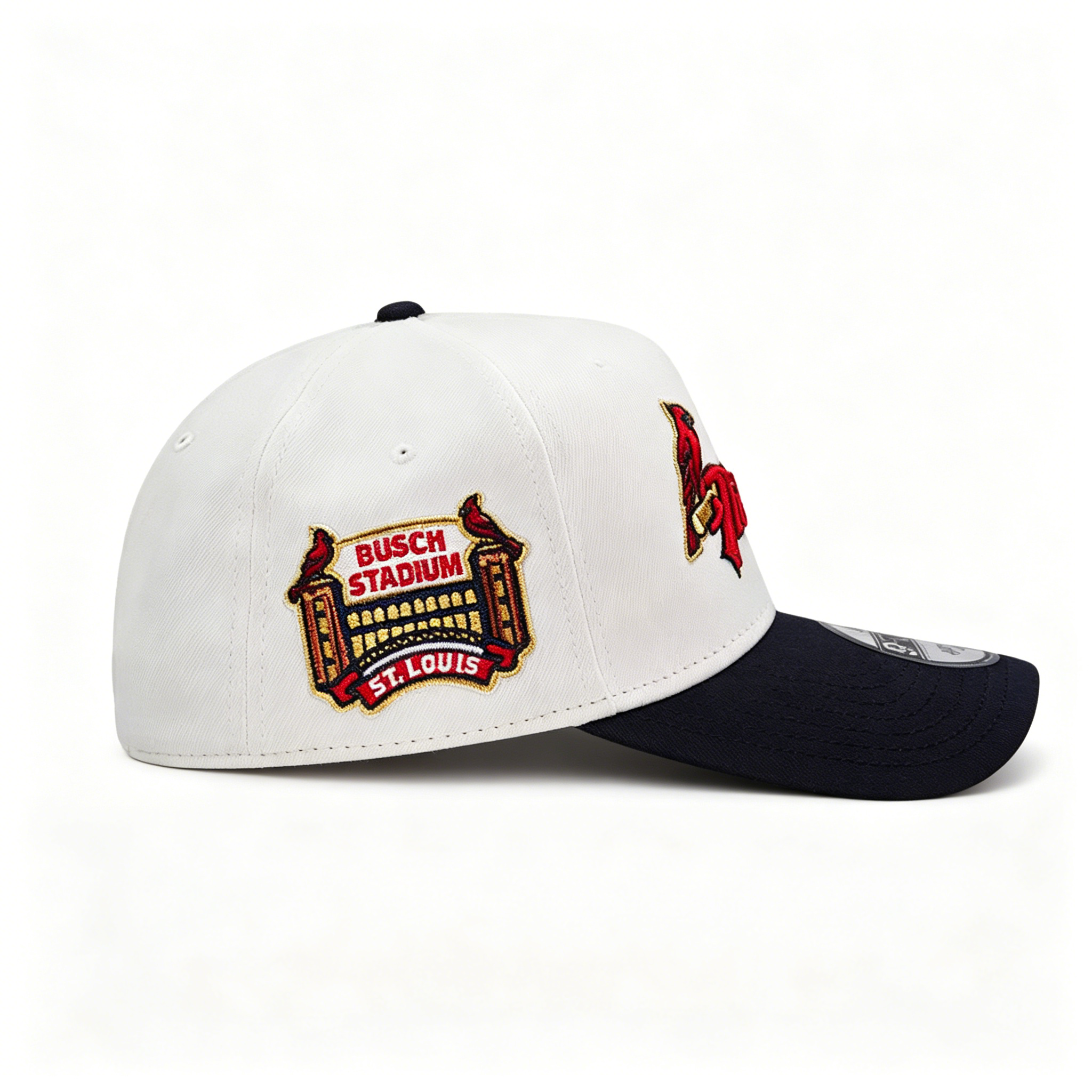 Side view of St. Louis Cardinals hat showcasing the detailed, embroidered Busch Stadium St. Louis commemorative side patch.