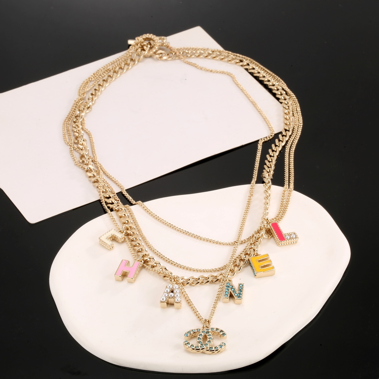 Chanel Multi Layered Light Gold Color Monogram Charms Necklace - Original Replica Club