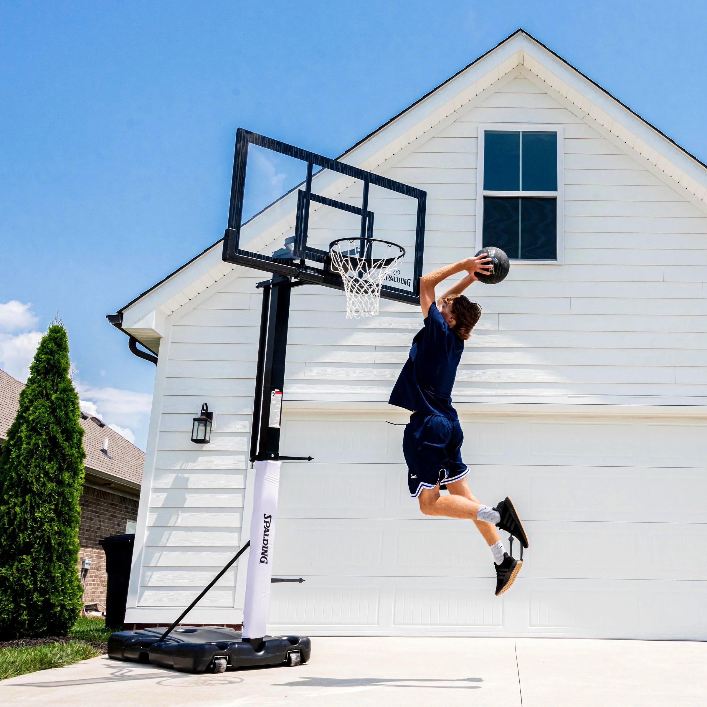 Spalding 60-Inch Portable Basketball Hoop with Acrylic Backboard, Screw Jack Lift & Arena Slam Rim-Outdoor Play - Image 12