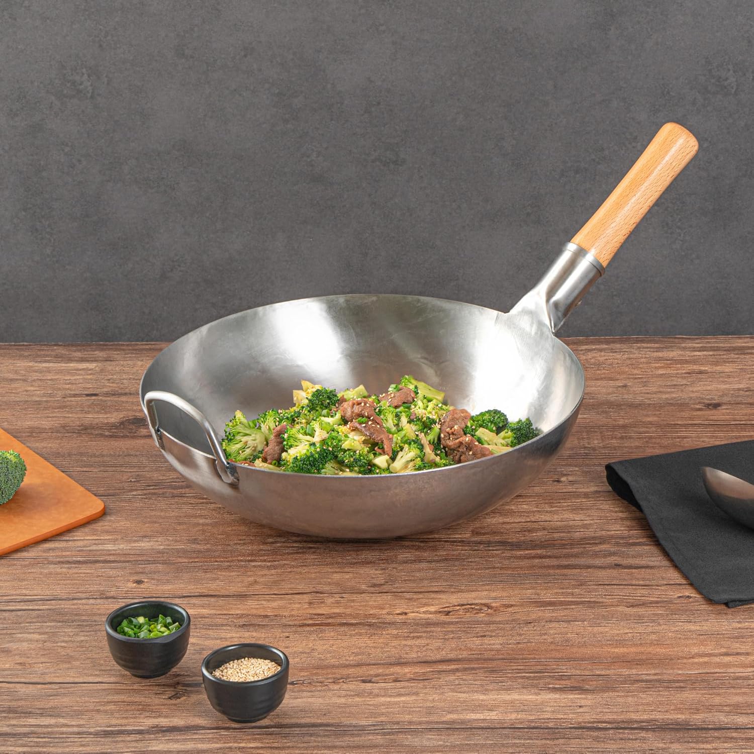 Restaurantware Carbon Steel Wok 1 Pack of 14 Inch Heavy-Duty Stir Fry Pan Silver Hand Hammered Wok Efficient Maneuvering Steel Helper Handle Uniform Heat Distribution Asian Cooking
