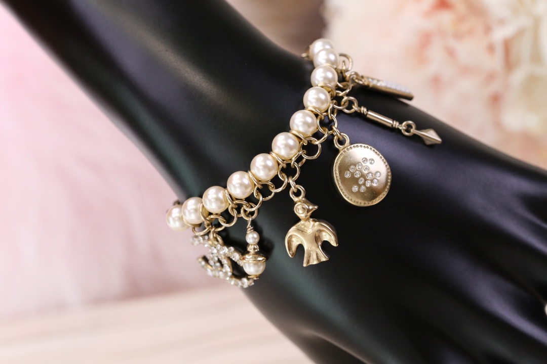 Chanel Bird CC Charms Chain Pearl Tassel Bracelet - Original Replica Club