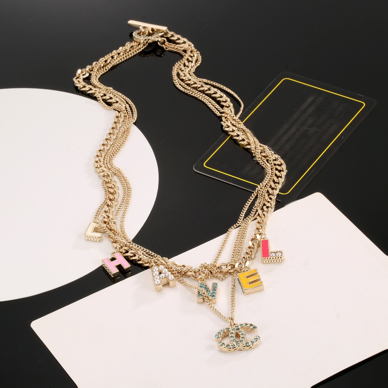 Chanel Multi Layered Light Gold Color Monogram Charms Necklace - Original Replica Club