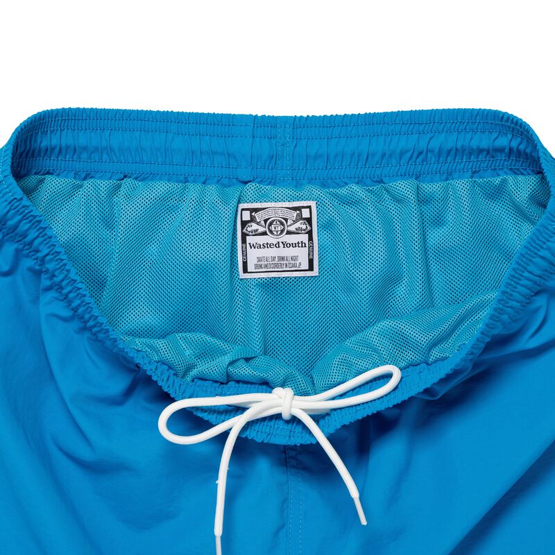 HUMAN MADE SWIM SHORTS