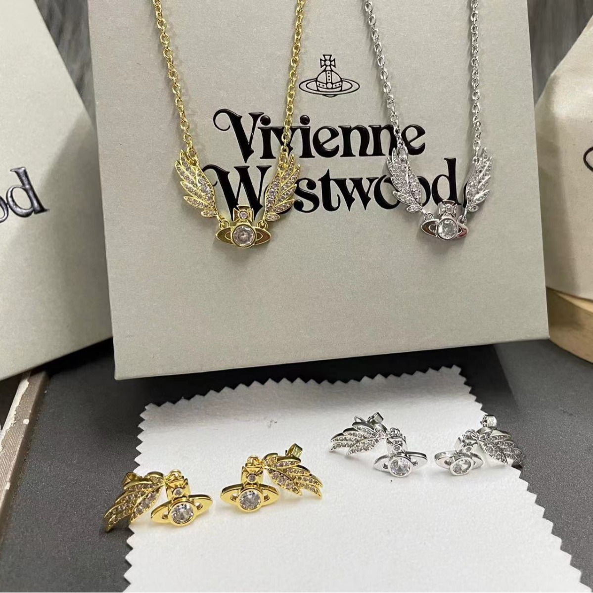 Vivienne Westwood Angel Wing Saturn Earrings - Original Replica Club