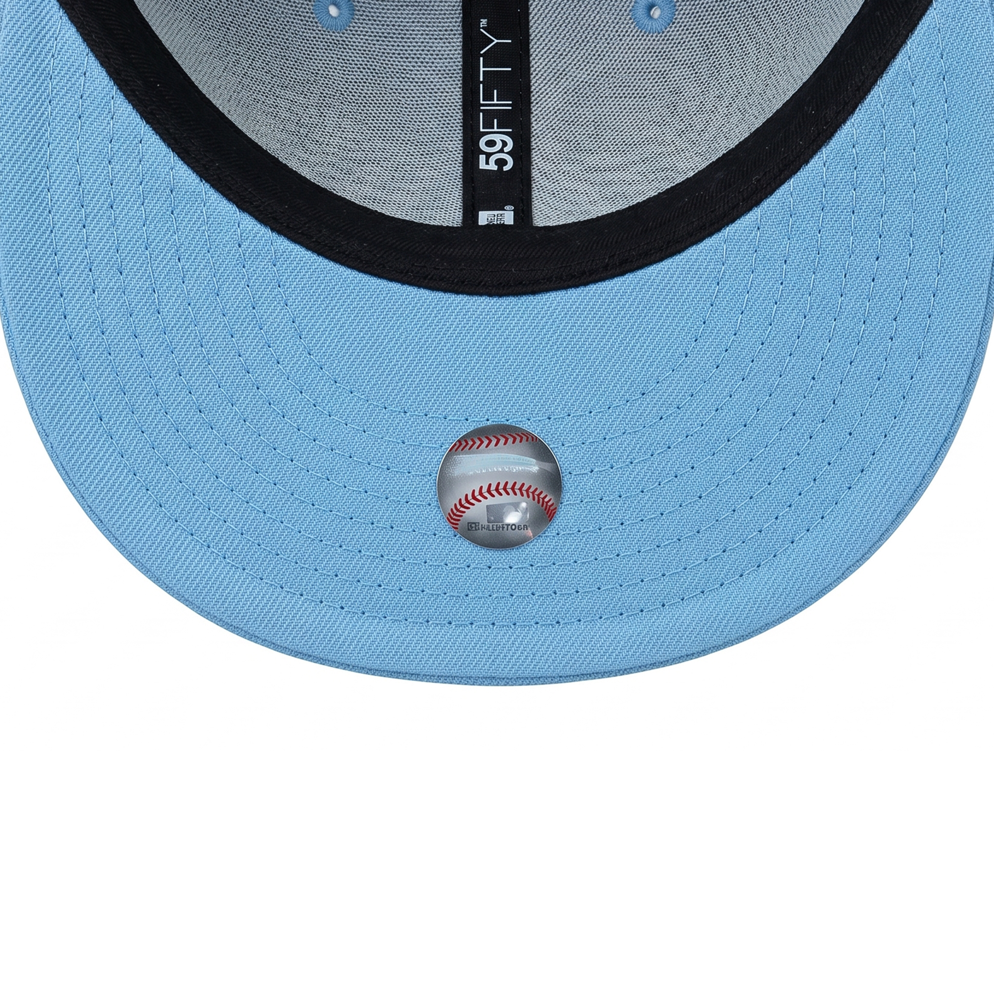 Light blue undervisor of the New York Yankees 59FIFTY hat featuring the official MLB hologram sticker and black sweatband.