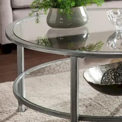Glenn Distressed Silver Round Coffee Table with Glass Top and Shelf by SEI Furniture