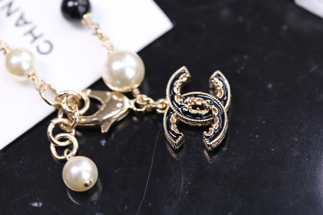 Chanel Black Bead Vintage Pearl Bracelet with CC Charm - Original Replica Club
