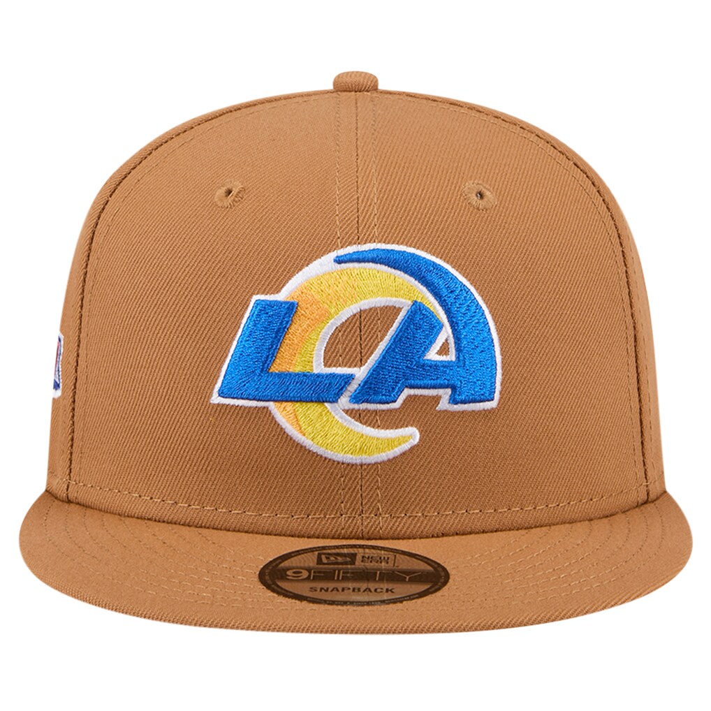 Front view of the tan Los Angeles Rams New Era 9FIFTY hat displaying the vibrant blue and yellow LA logo