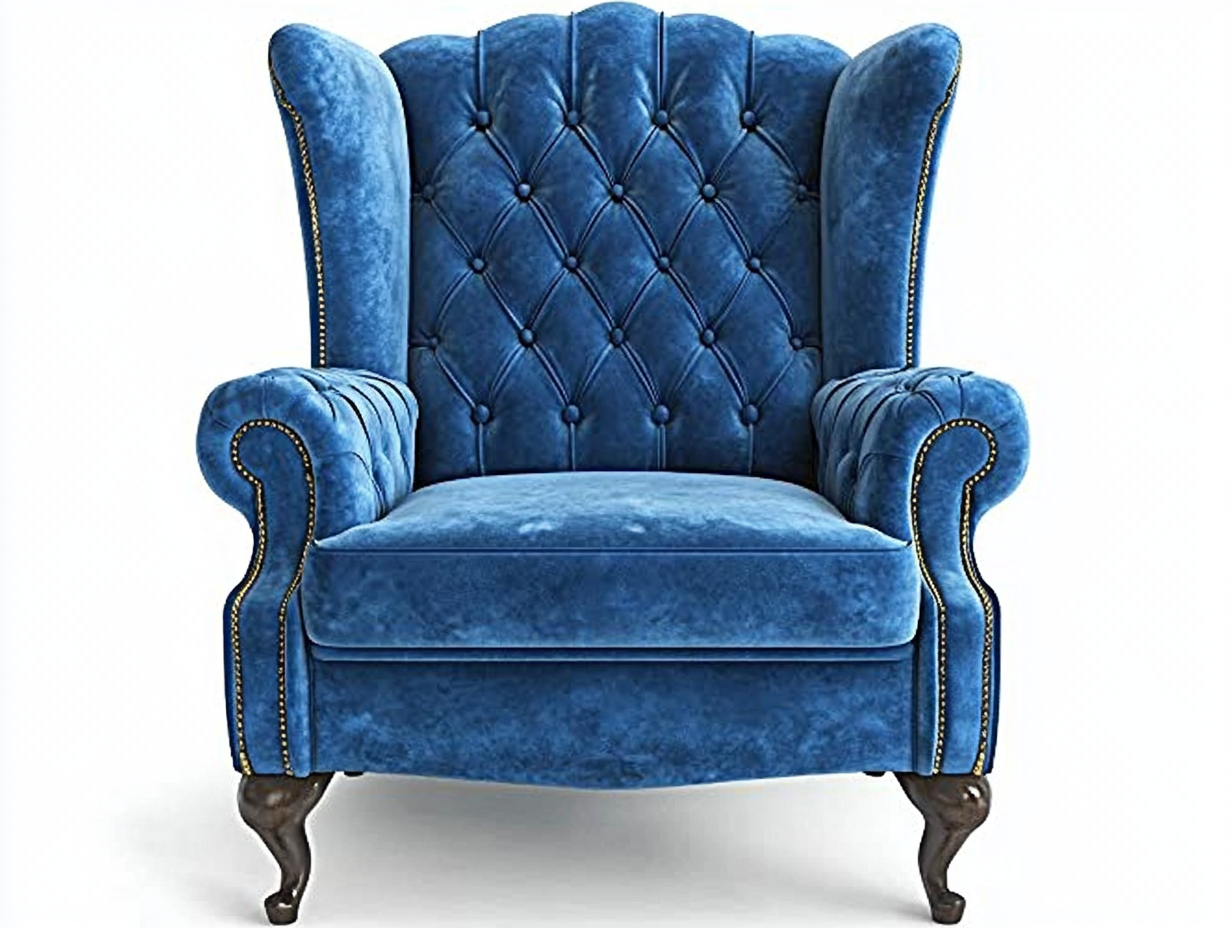 Sillón wingback azul con tela de terciopelo y detalles de tachuelas