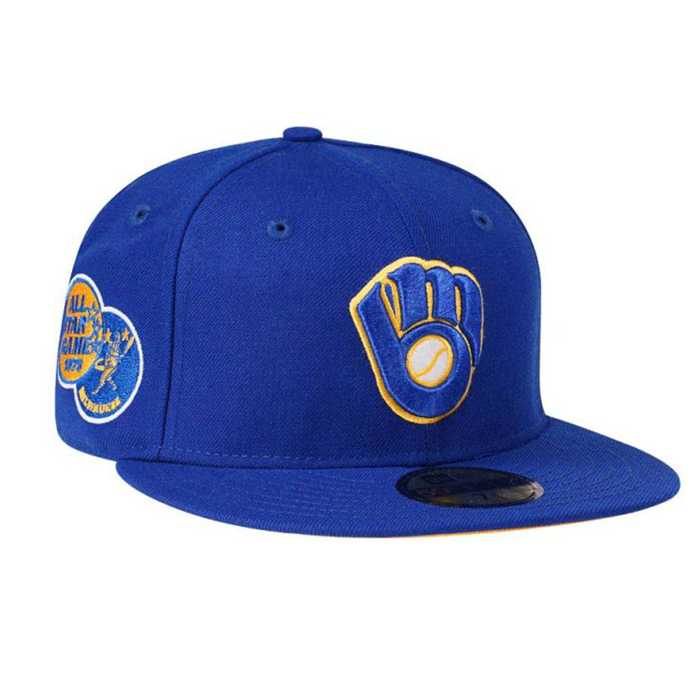 Front right angle of the New Era Milwaukee Brewers 59FIFTY Fitted Hat in royal blue, featuring the retro MB glove logo and a 1975 All-Star Game side patch.