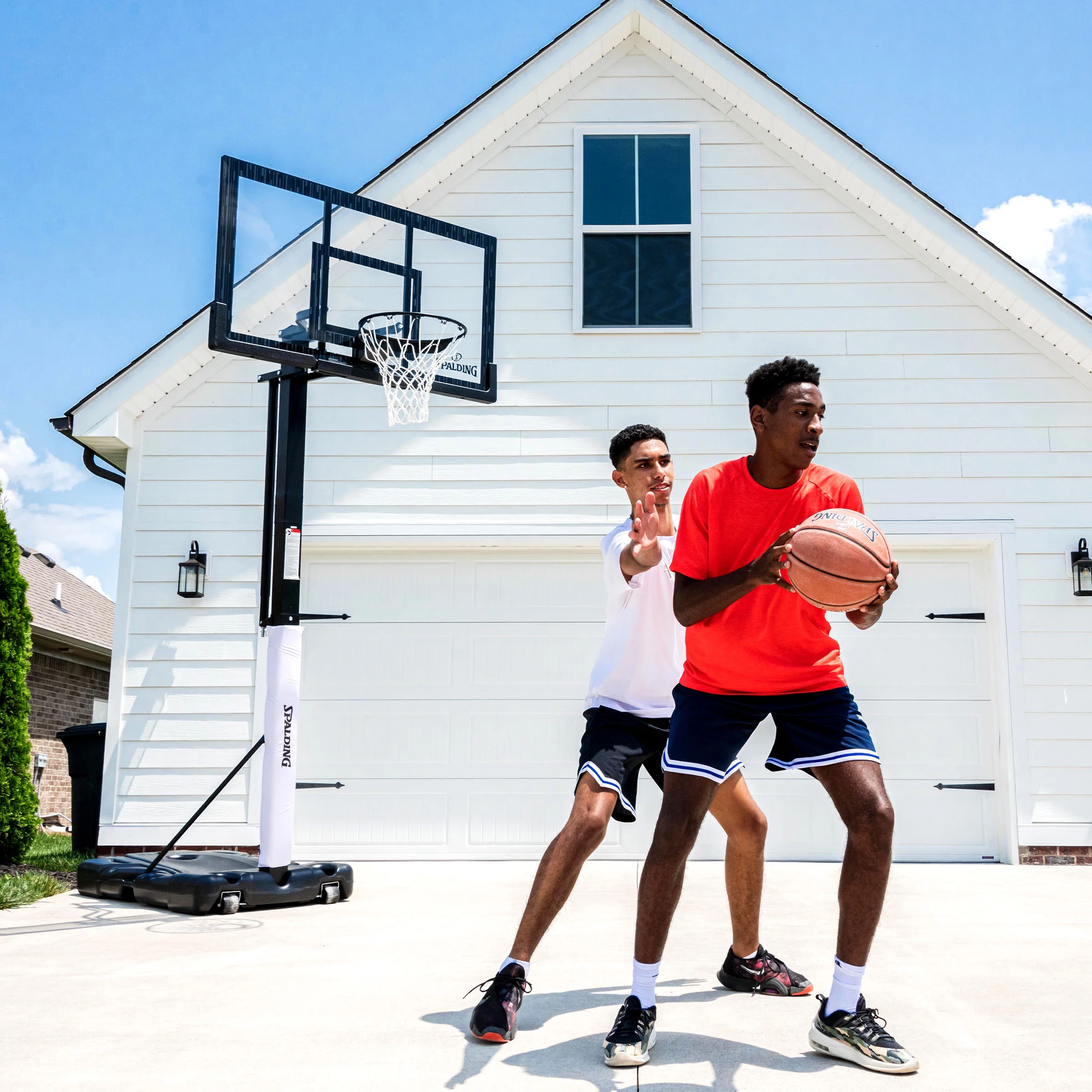 Spalding 60-Inch Portable Basketball Hoop with Acrylic Backboard, Screw Jack Lift & Arena Slam Rim-Outdoor Play - Image 11