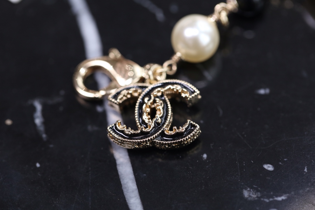 Chanel Black Bead Vintage Pearl Bracelet with CC Charm - Original Replica Club