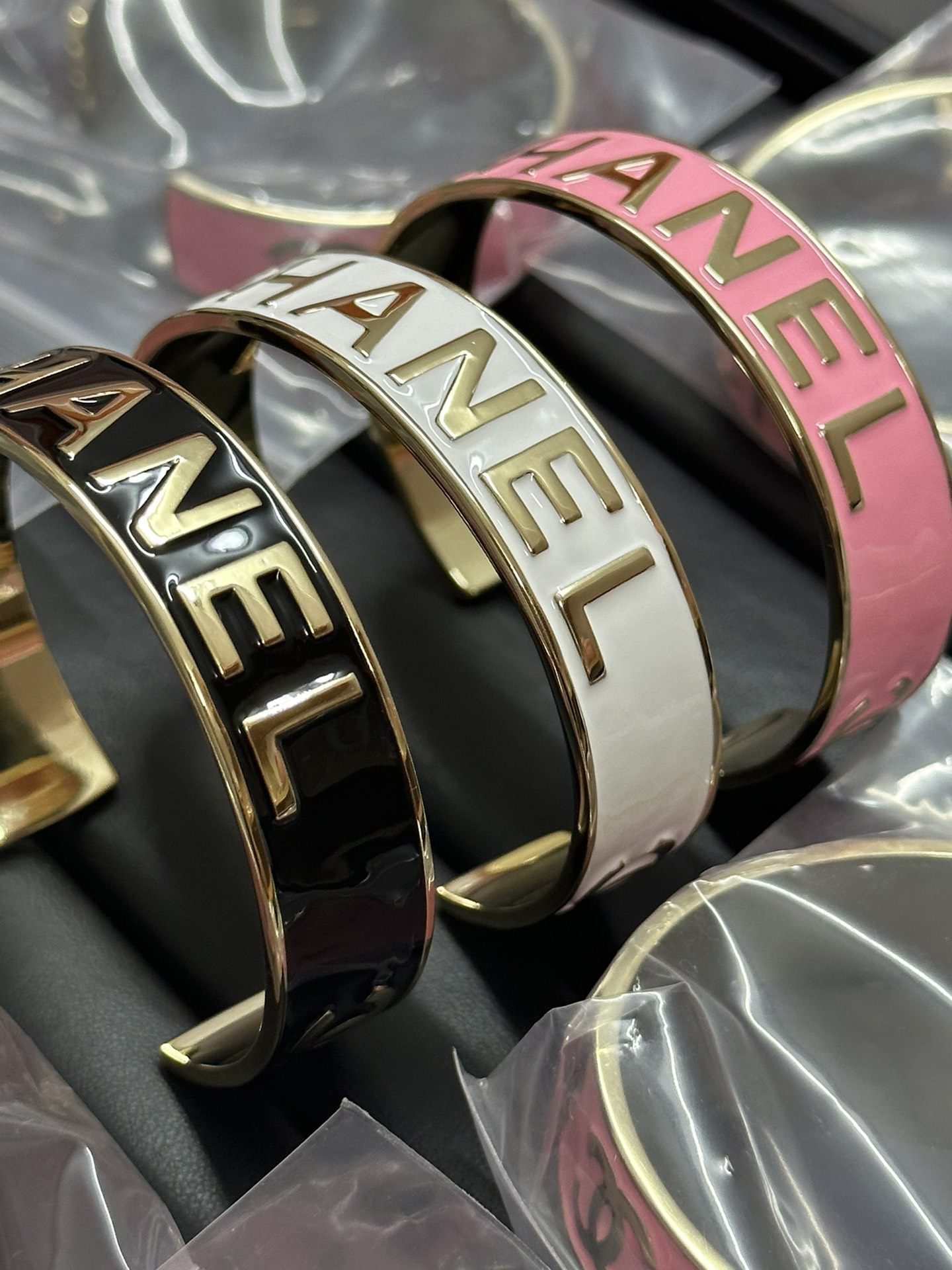 Chanel Embossed Monogram Open Cuff Bangle Bracelet - Original Replica Club