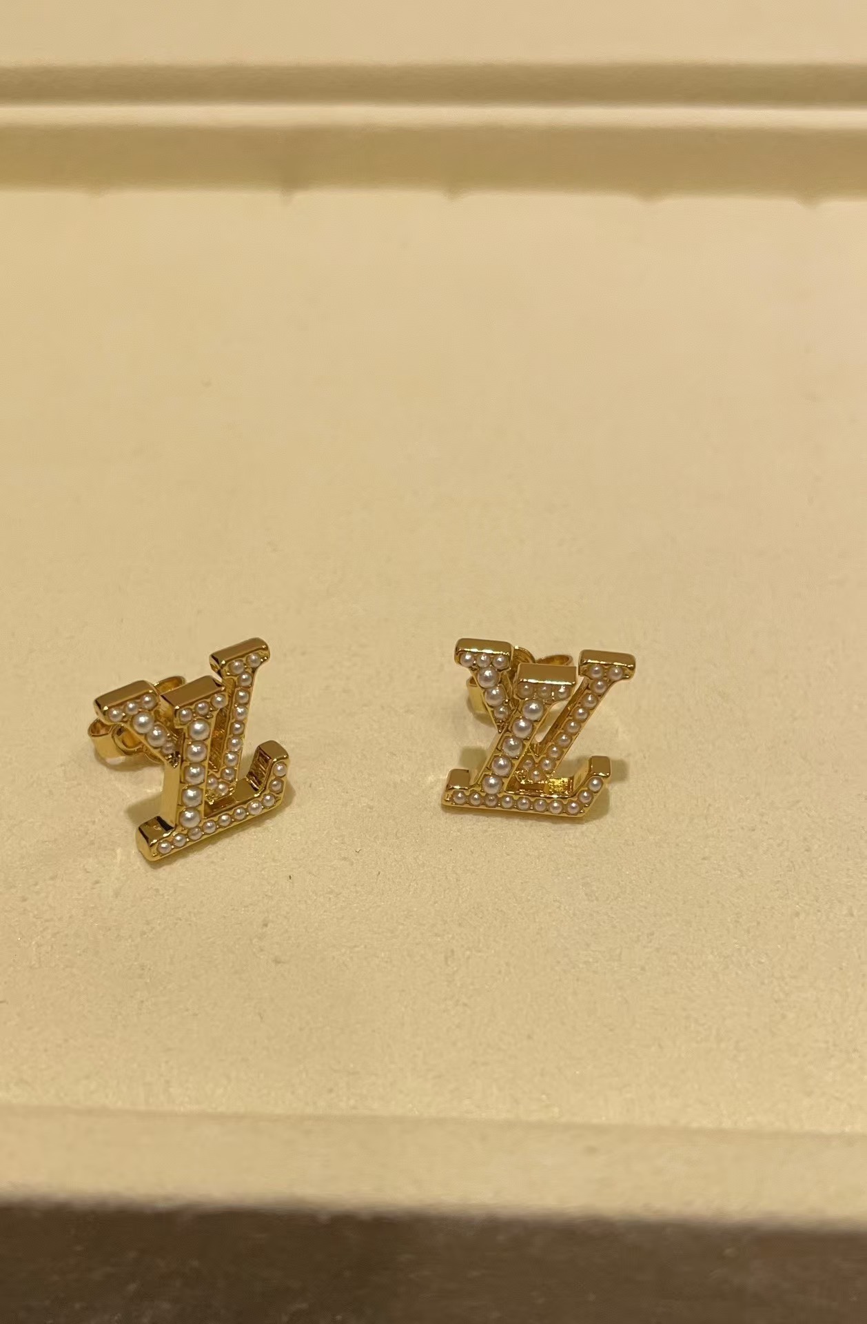 Louis Vuitton Pearl Paved LV Letter Stud Earrings - Original Replica Club