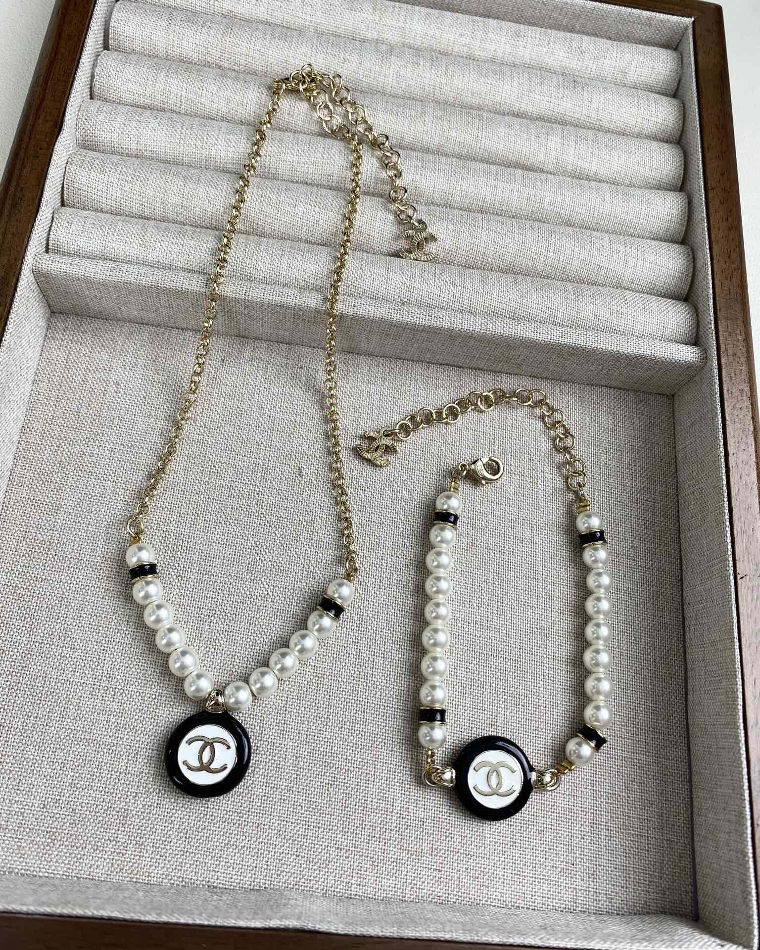 Chanel Black and White Round Charm Pearl Bracelet Necklace - Original Replica Club