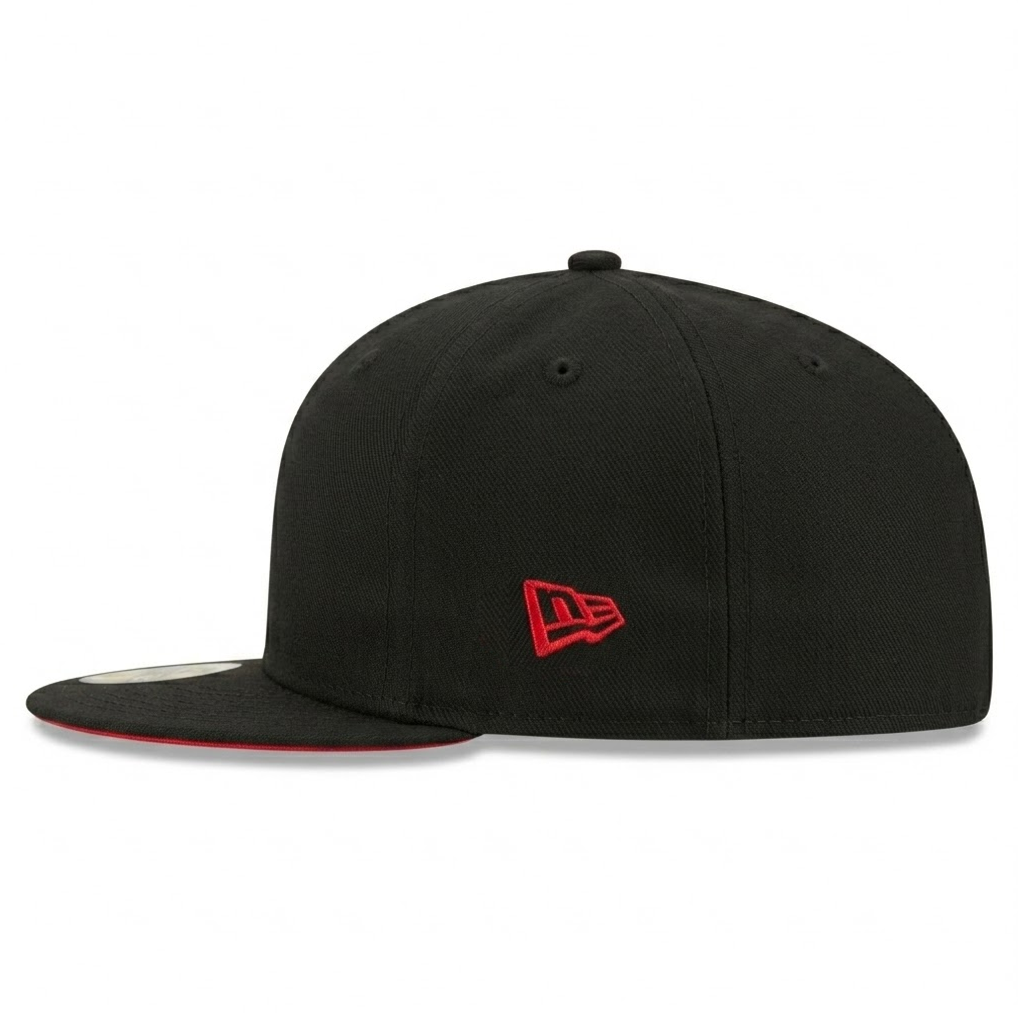 Side view of a black New Era fitted baseball cap with a red logo and red underbrim.
